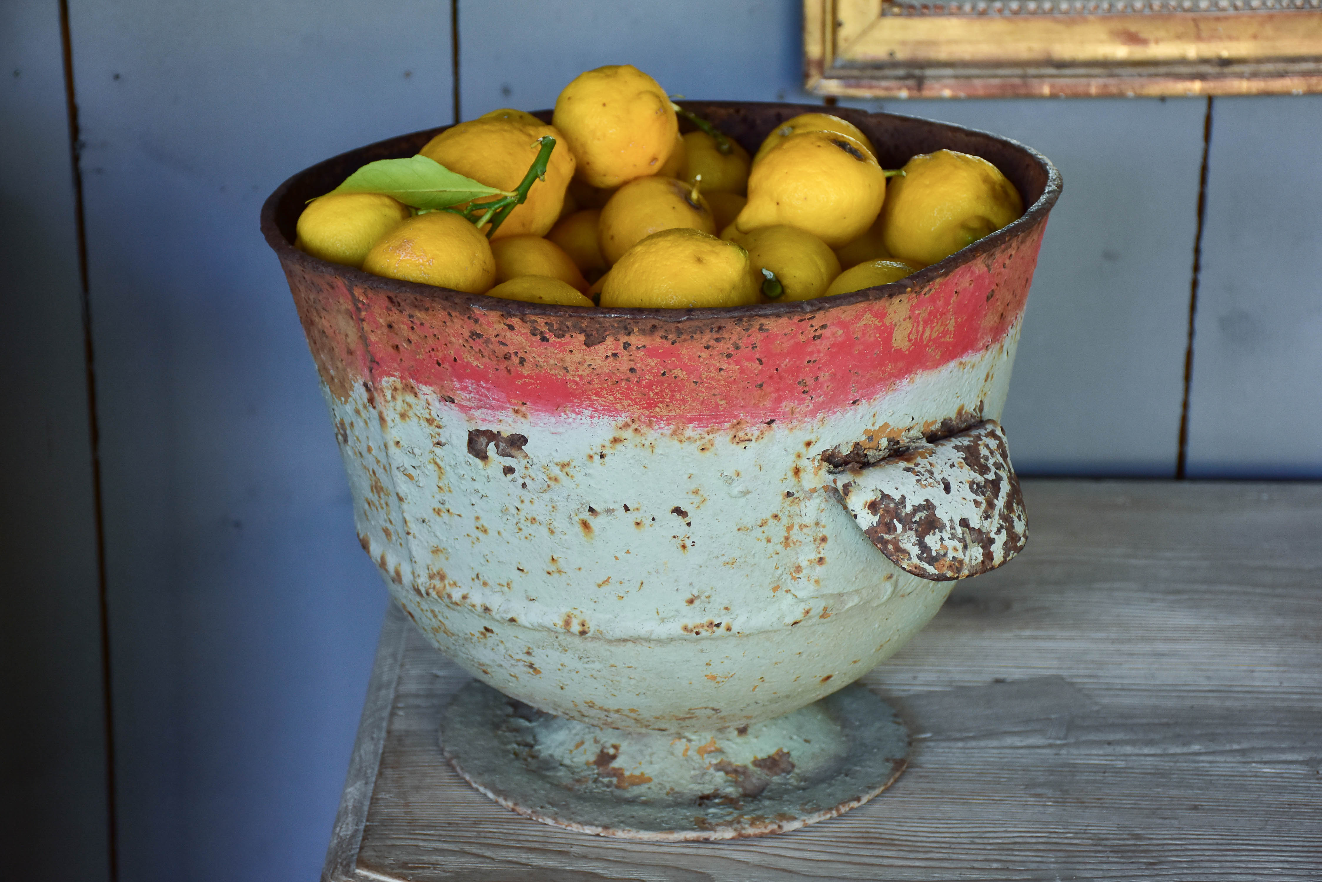 Rustic French planter with aqua and red patina