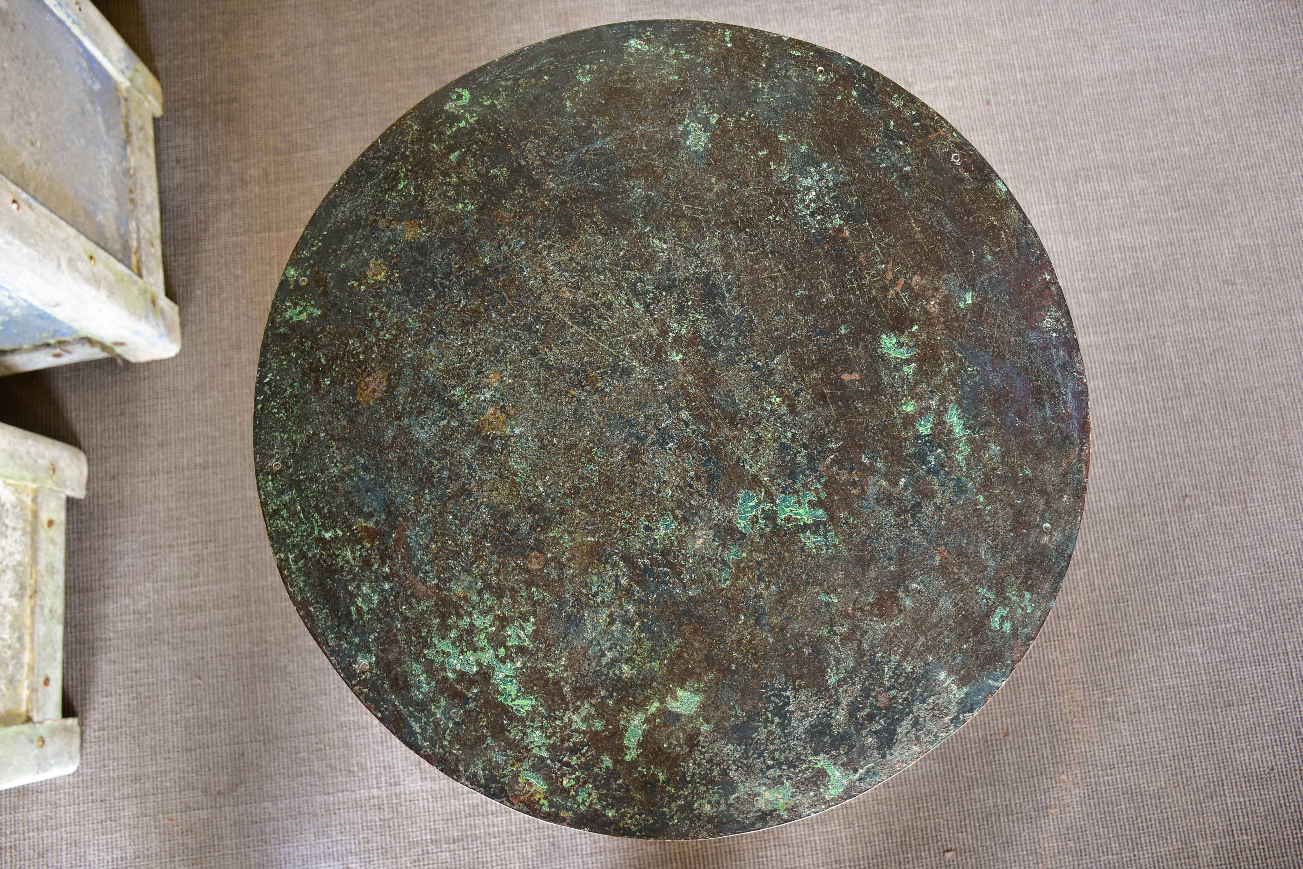 Round French garden table with green patina