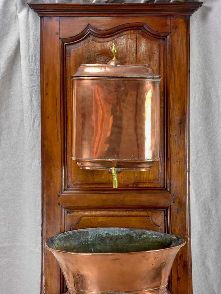 18th Century mounted copper basin on walnut panel