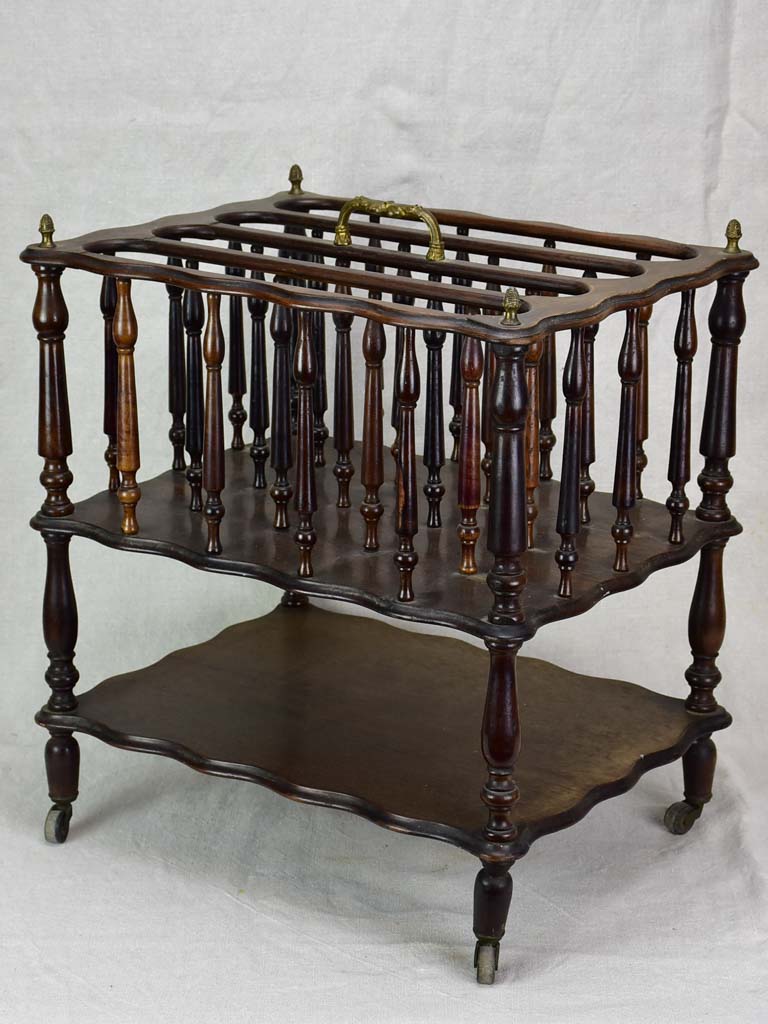 Antique French magazine rack on casters