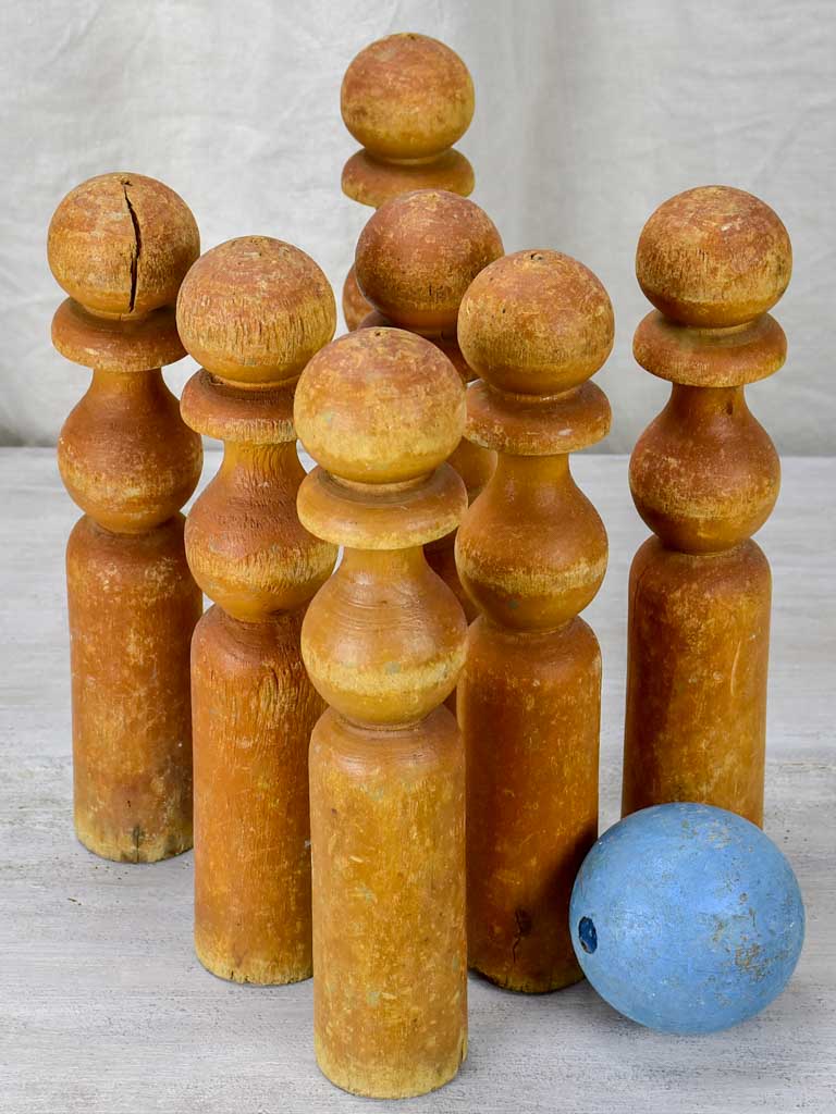 Set of 7 antique French wooden skittles and wooden blue ball