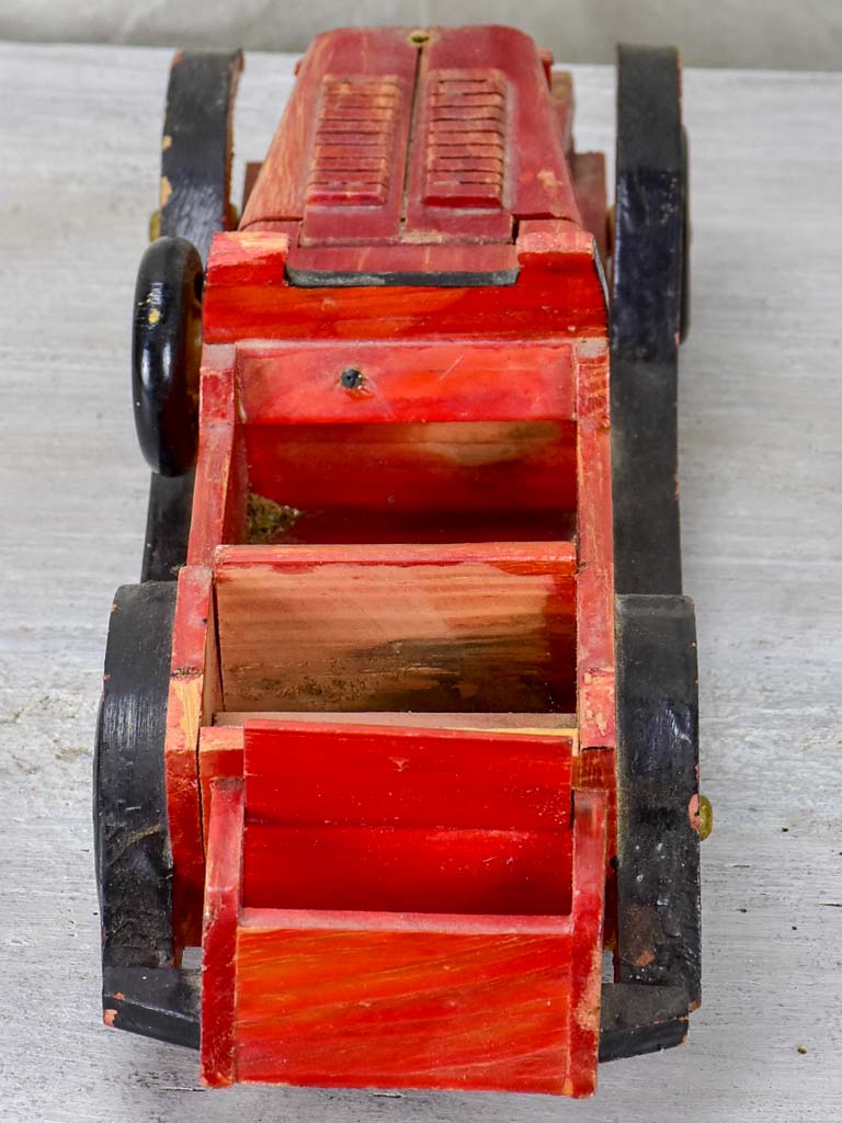 Aged French antique red wooden car