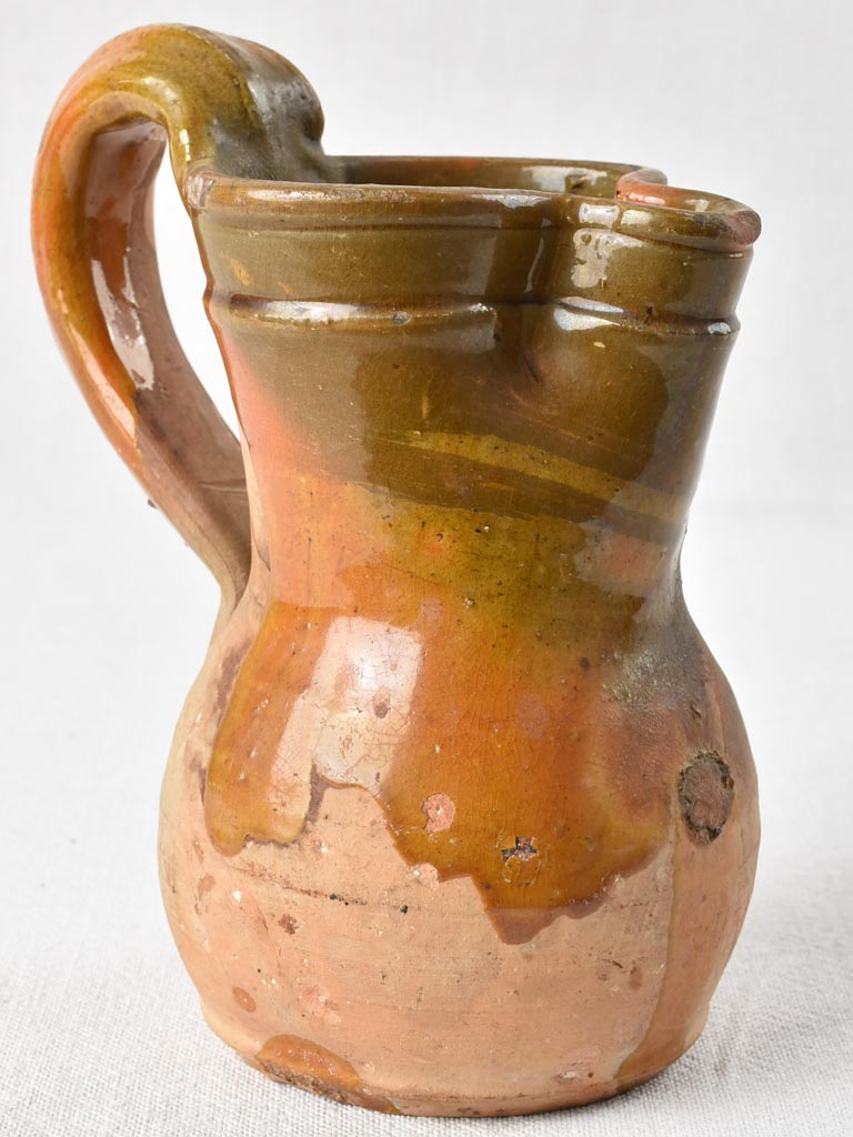 Small antique pitcher with brown glaze 8"