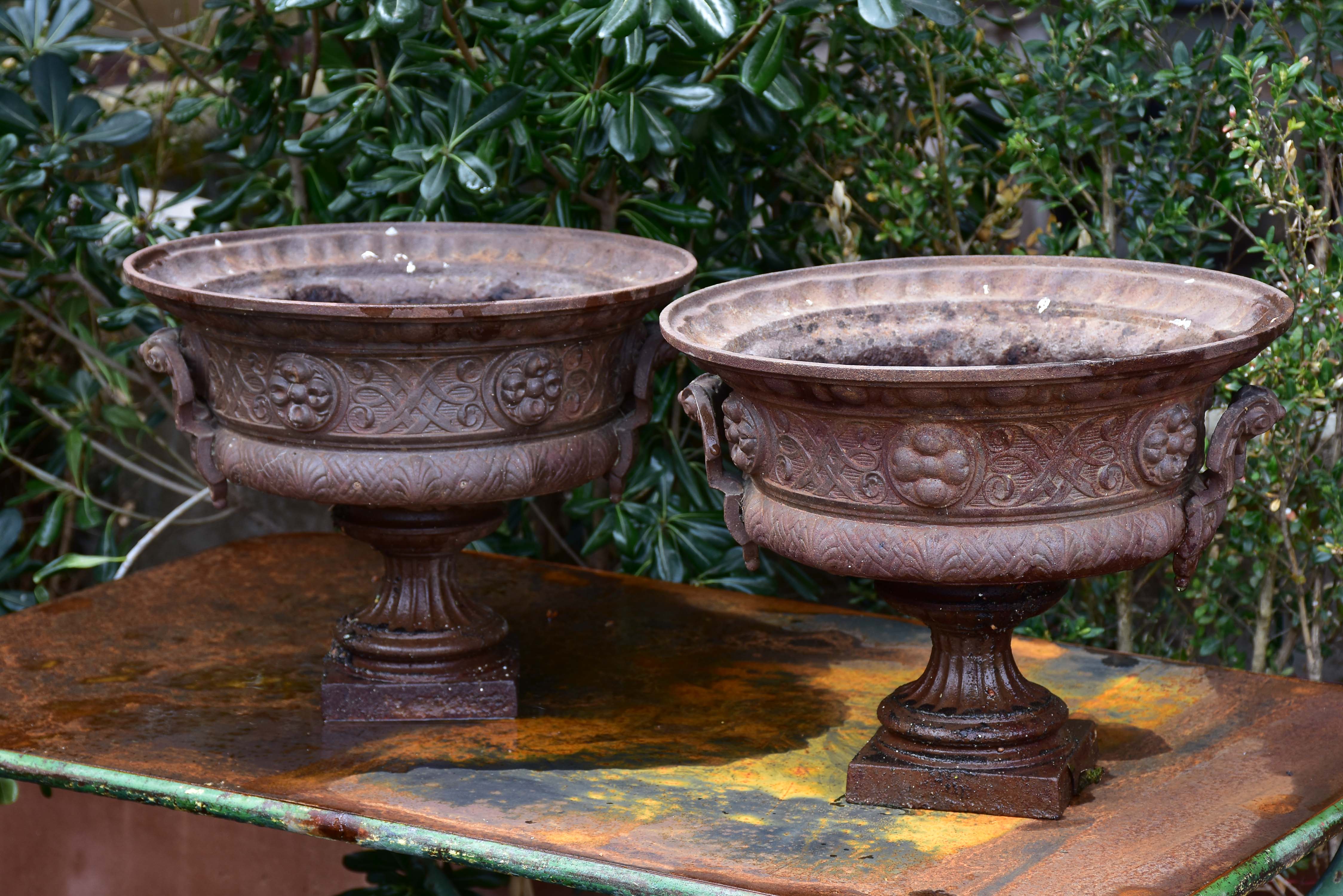 Pair of 19th century French garden urns with brown patina