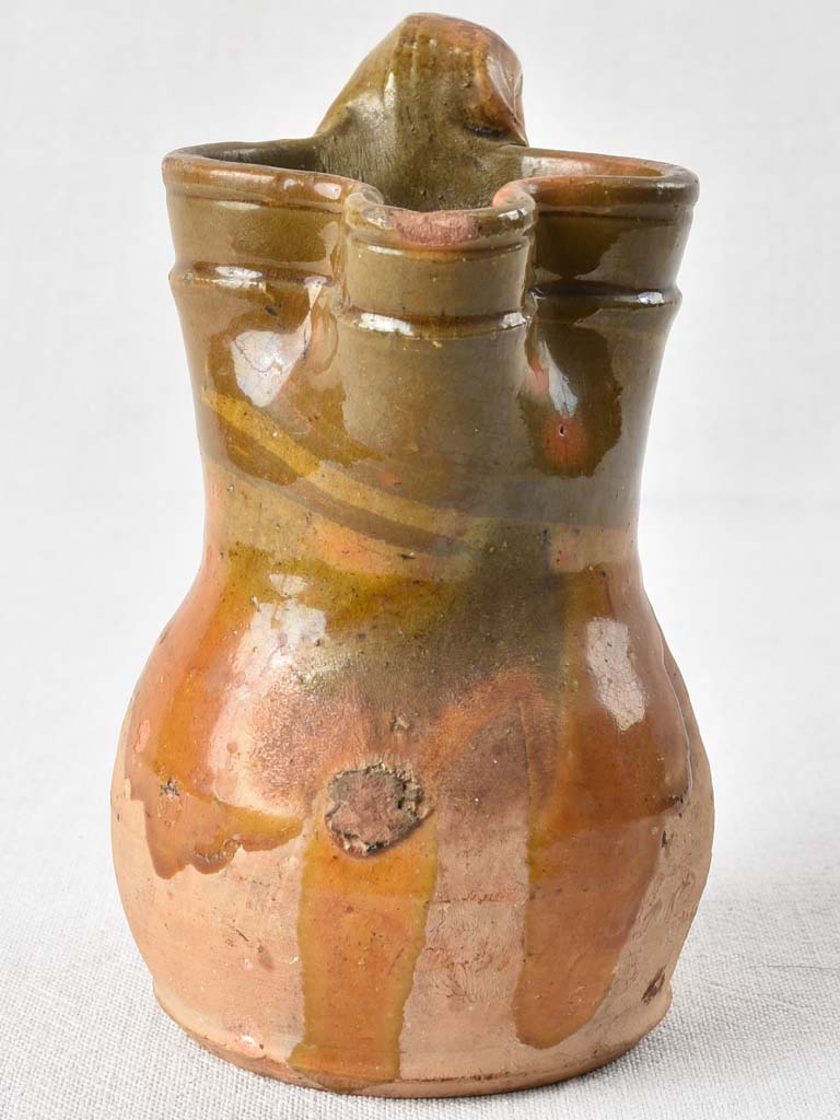 Small antique pitcher with brown glaze 8"