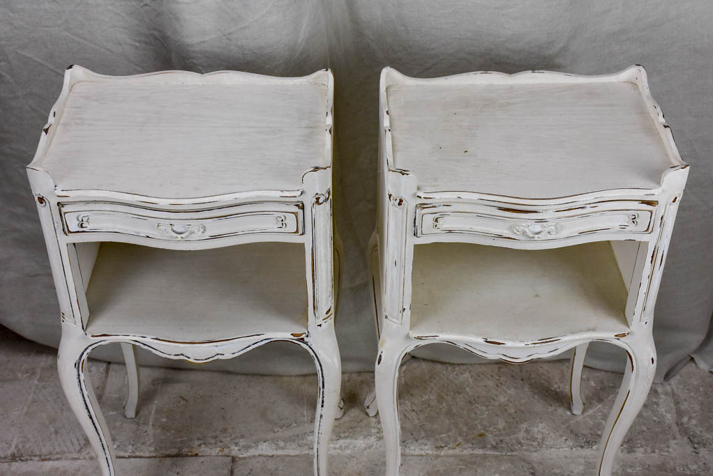 Pair of vintage French nightstands with white patina