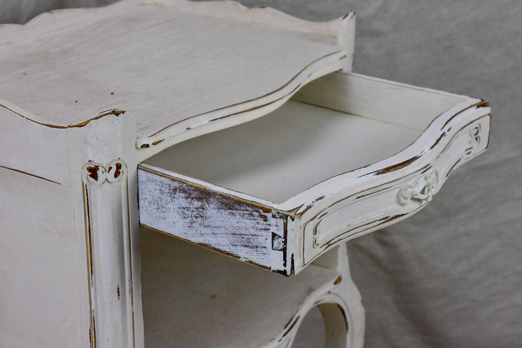 Pair of vintage French nightstands with white patina