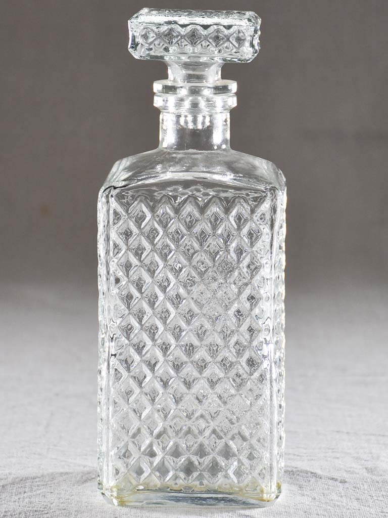 Vintage French whisky decanter with lattice pattern