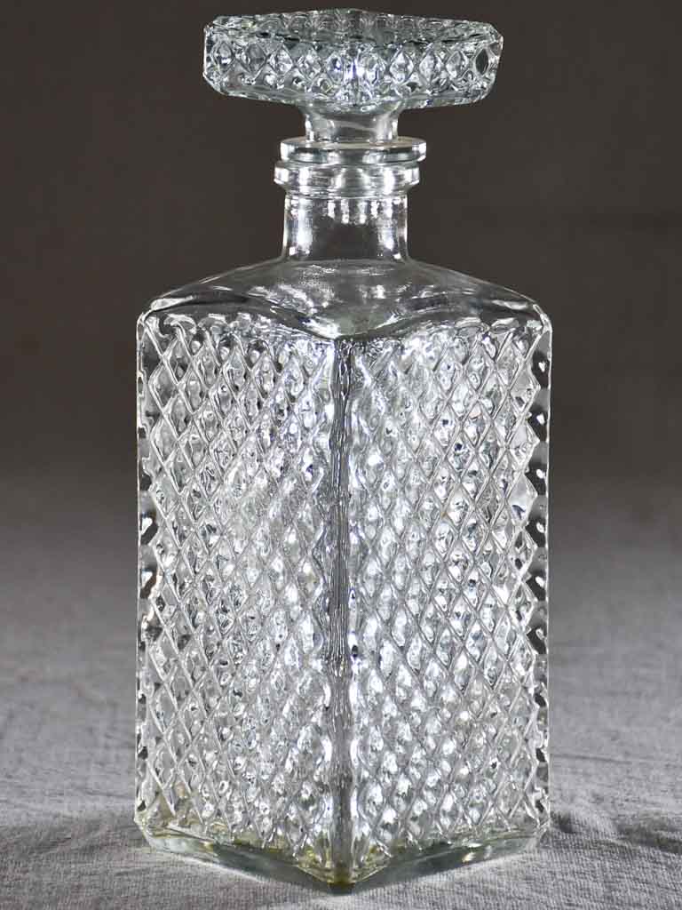 Vintage French whisky decanter with lattice pattern