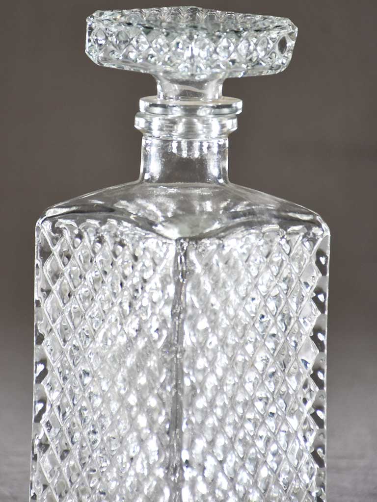 Vintage French whisky decanter with lattice pattern