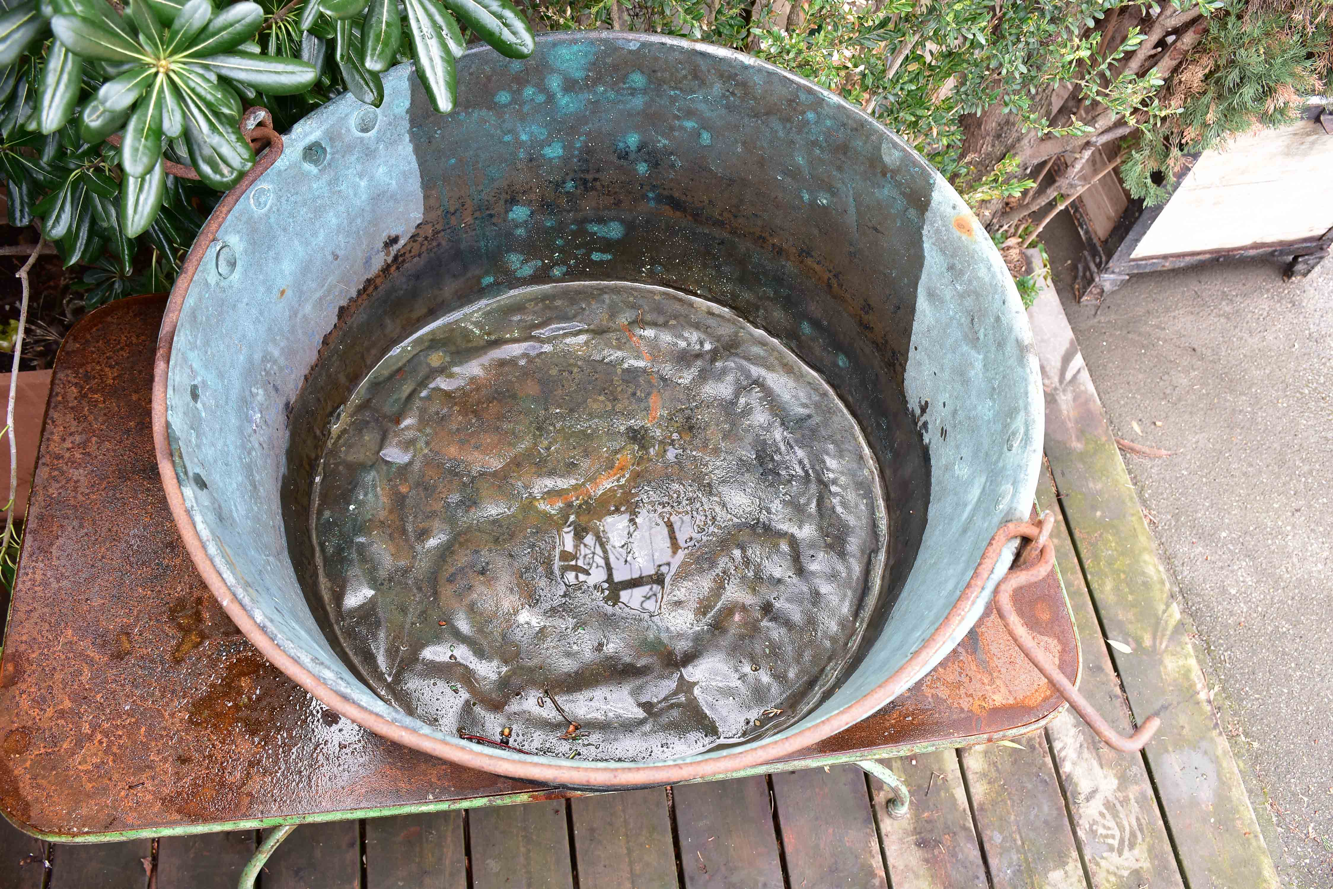 19th century copper cauldron with iron handle