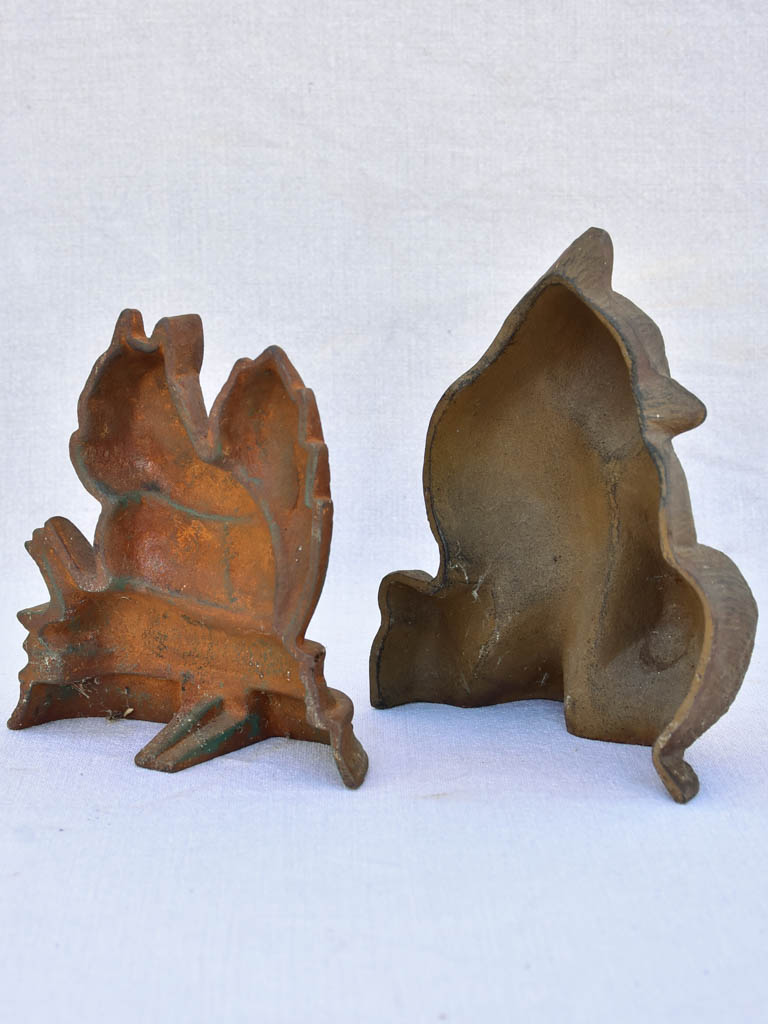 Two vintage French cast iron doorstops - cat and squirrel