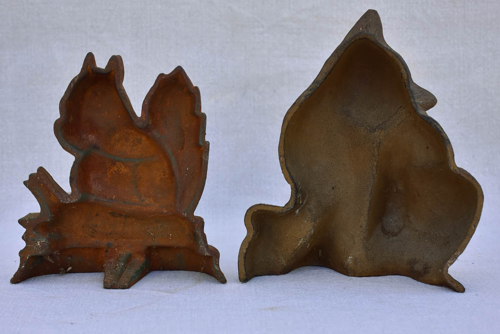 Two vintage French cast iron doorstops - cat and squirrel