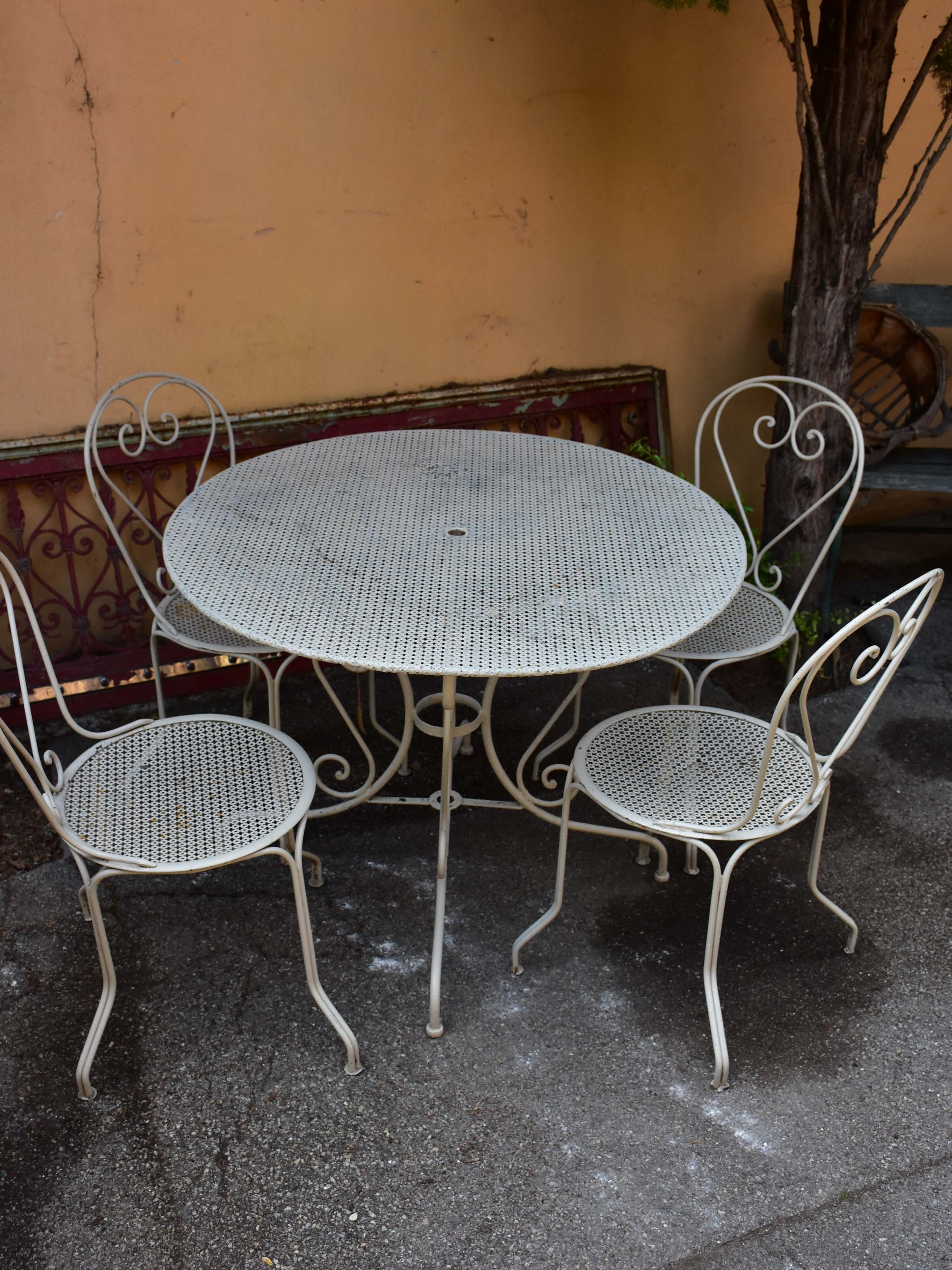 Vintage French garden table with four chairs