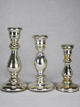 Three mercury glass candlesticks with hand-painted flowers