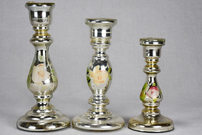 Three mercury glass candlesticks with hand-painted flowers