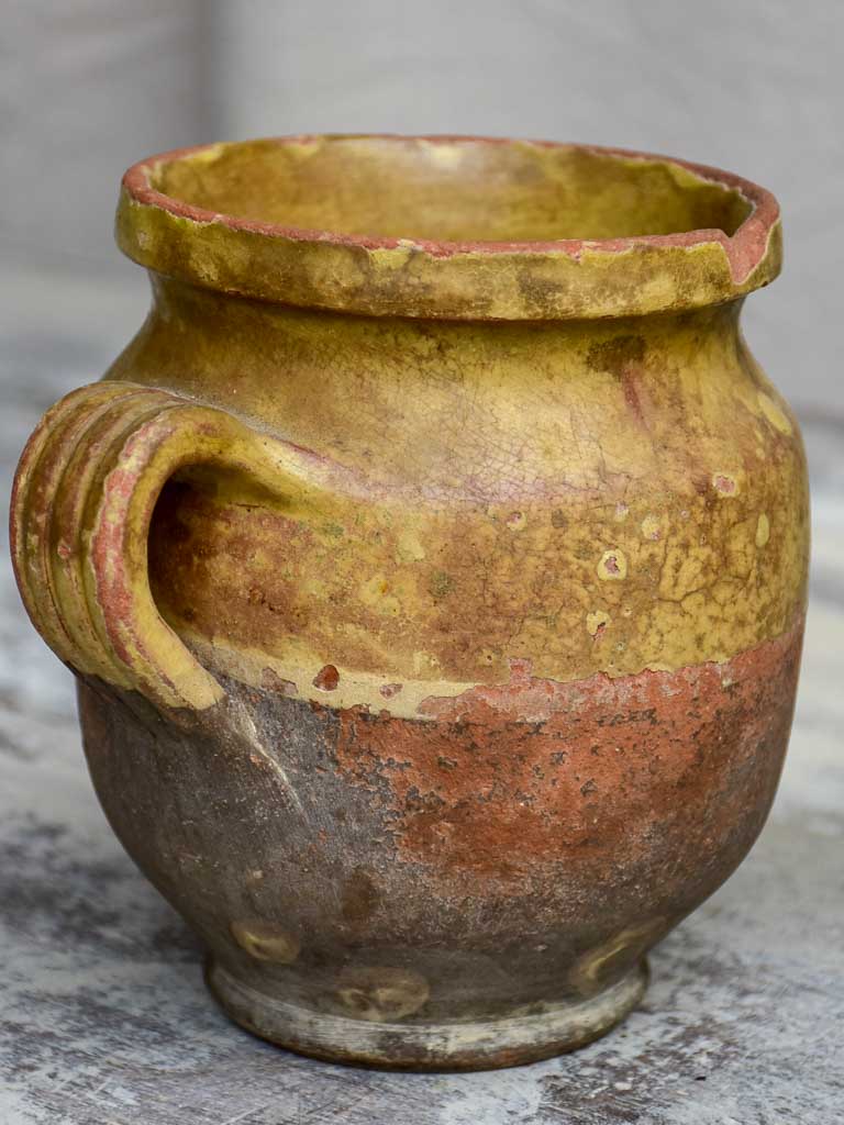 Antique French cup with yellow glaze