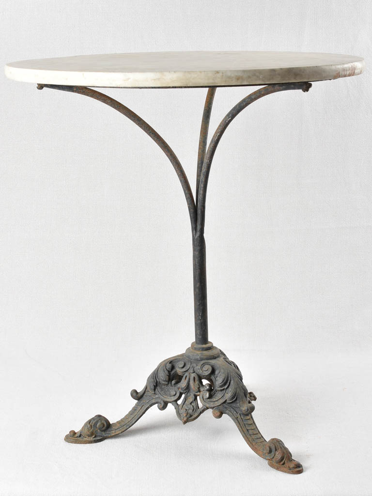 Antique cast iron bistro table with marble top