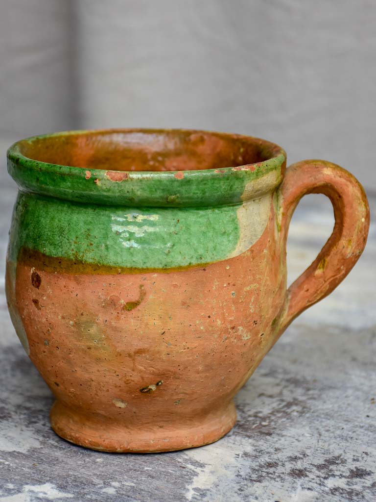 Antique French mug with green glaze