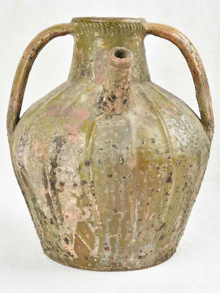 18th century walnut oil pitcher with green patina 12½"