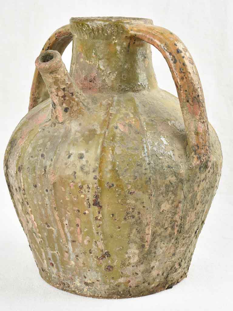 18th century walnut oil pitcher with green patina 12½"