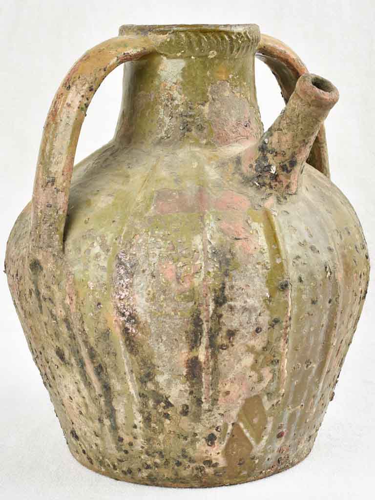 18th century walnut oil pitcher with green patina 12½"