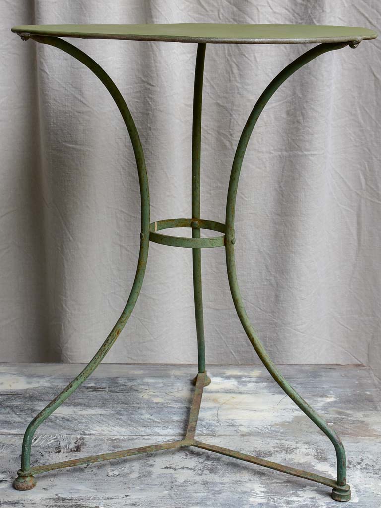 Antique French garden table with green patina