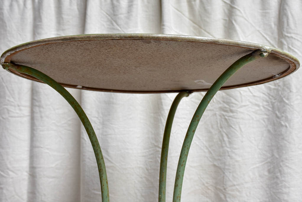 Antique French garden table with green patina