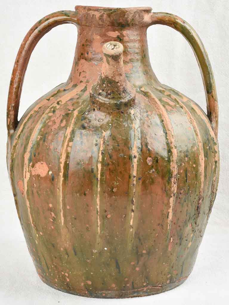 Rustic 19th century walnut oil pitcher 15"