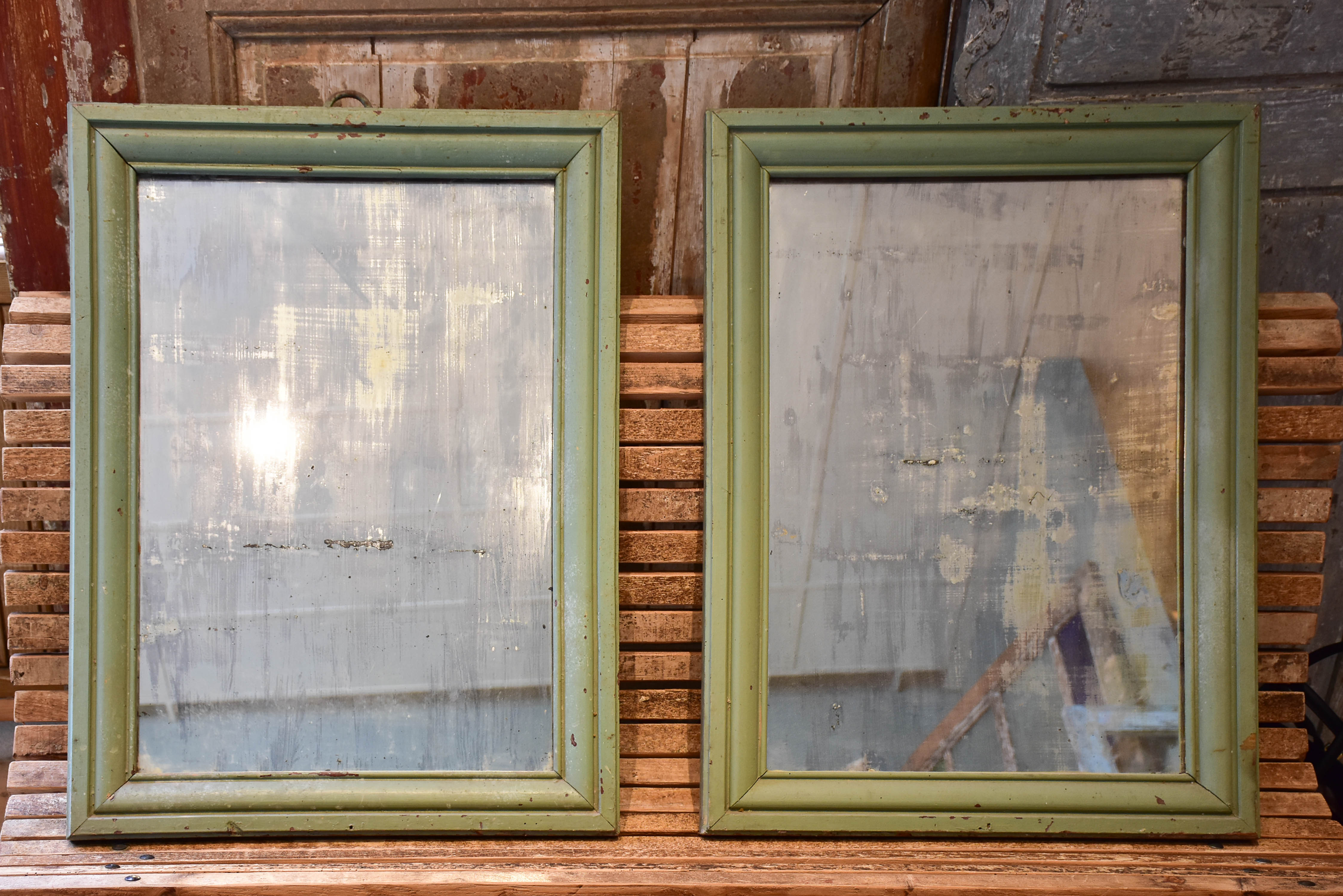 Pair of of French bistro mirrors with green frames