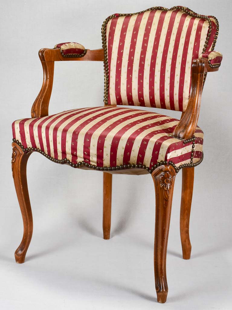 Louis XV-style armchair with red-striped upholstery