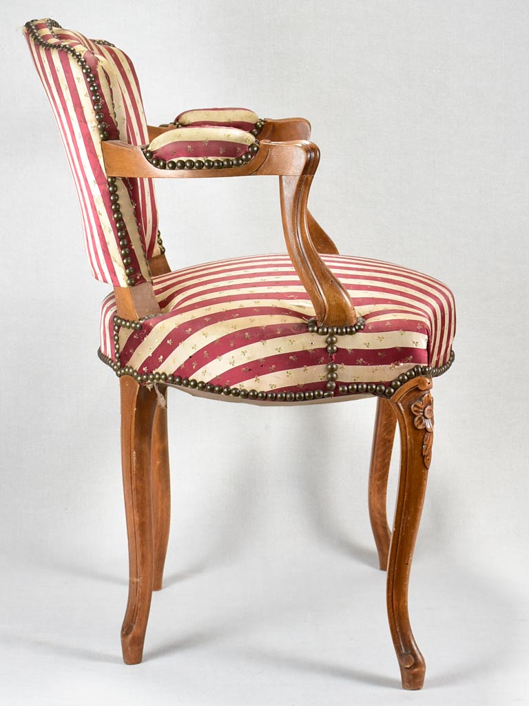 Louis XV-style armchair with red-striped upholstery