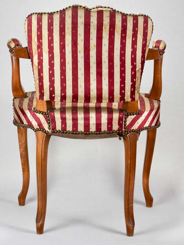 Louis XV-style armchair with red-striped upholstery