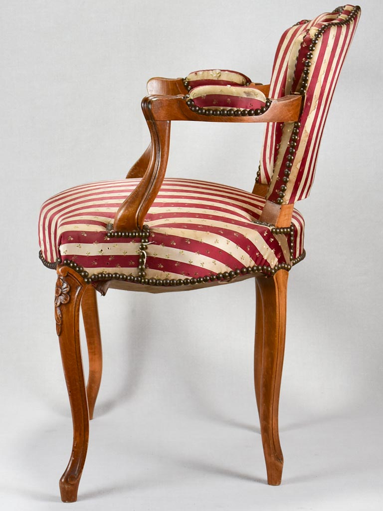 Louis XV-style armchair with red-striped upholstery