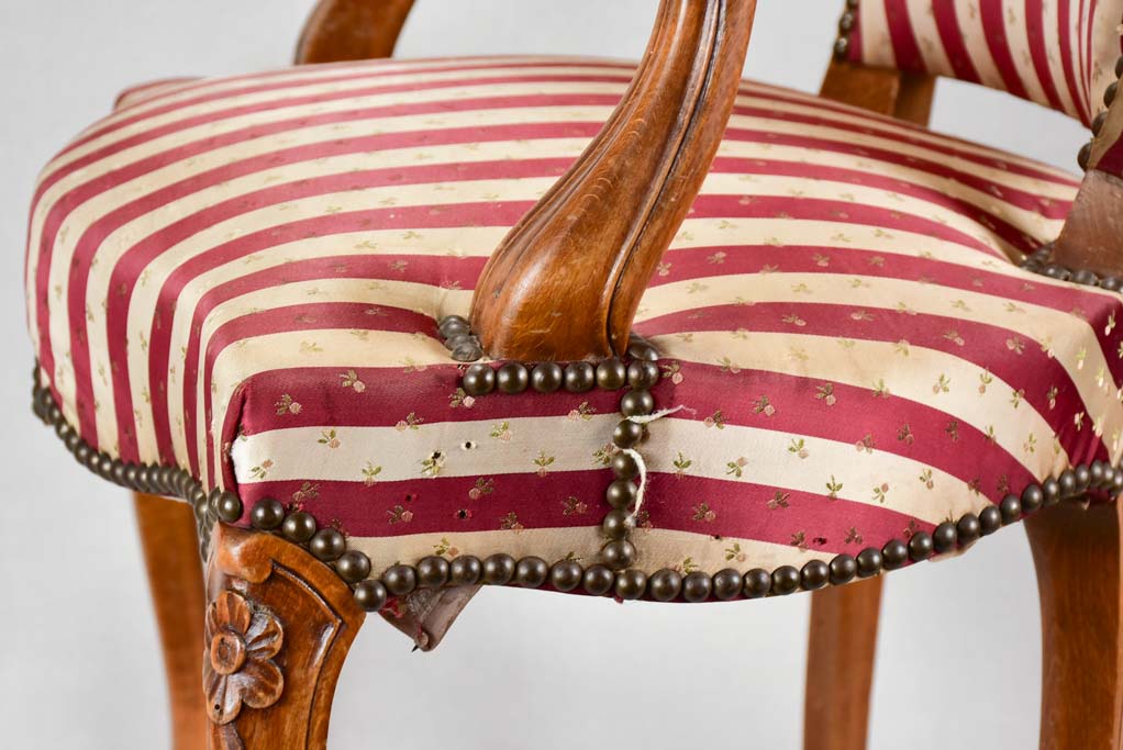 Louis XV-style armchair with red-striped upholstery