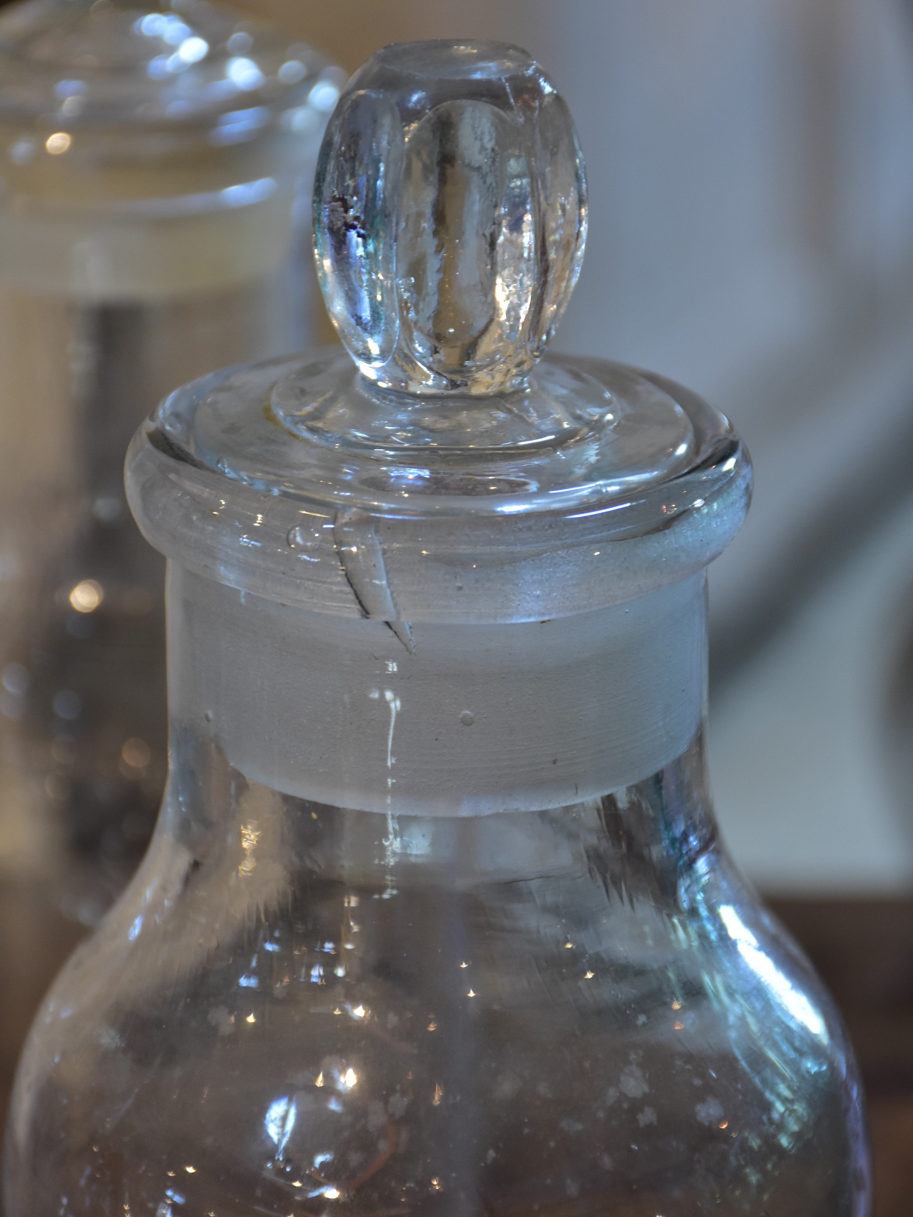 Collection of six antique French bottles with lids