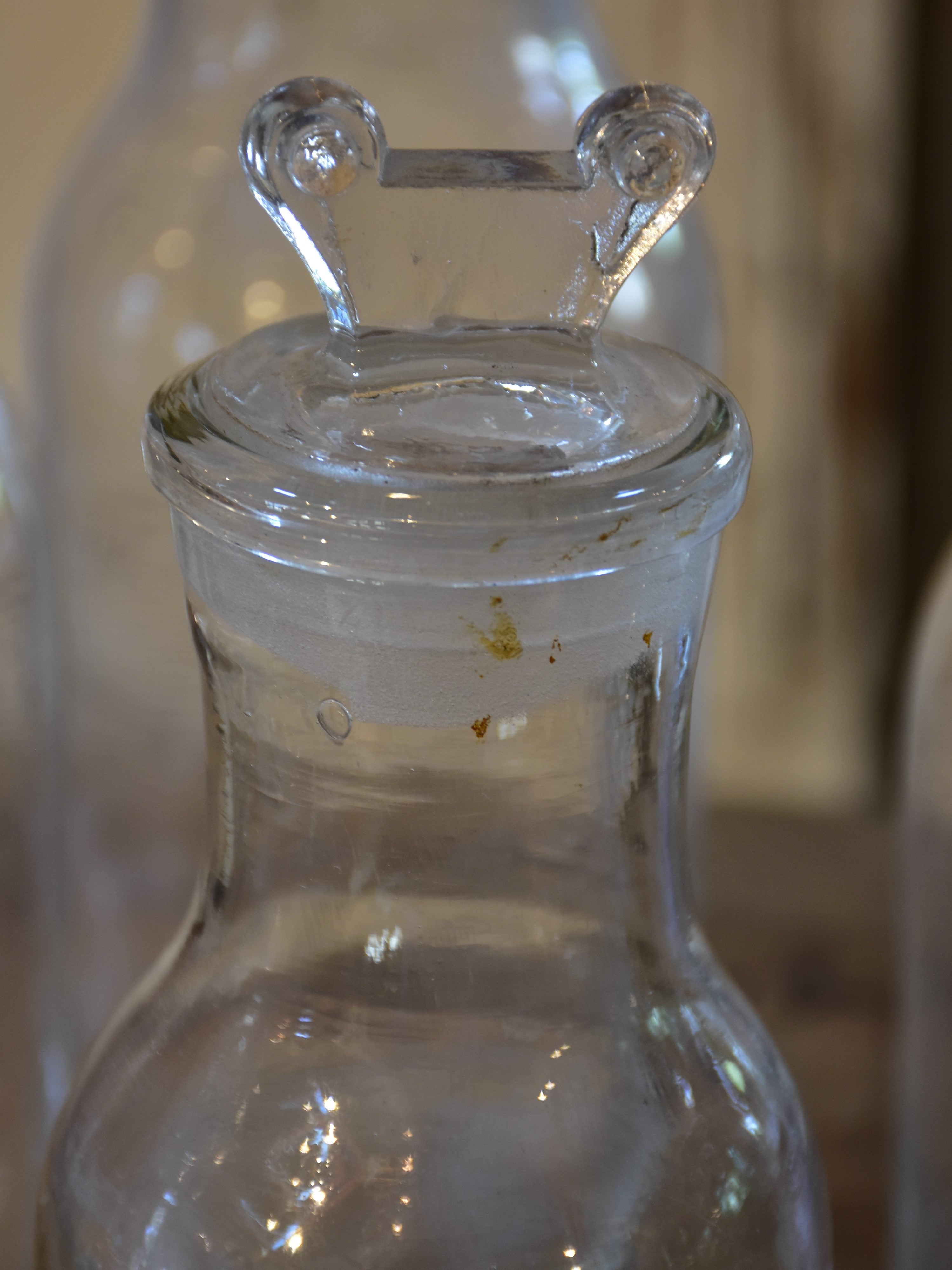 Collection of six antique French bottles with lids