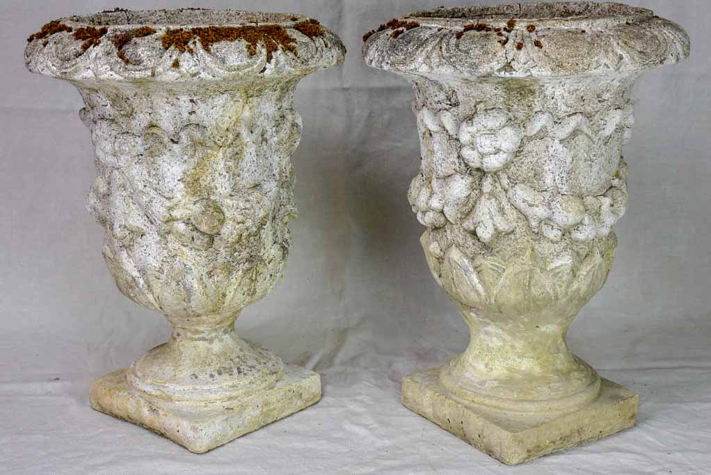 Pair of mid century weathered garden urns with decorative moldings 22"