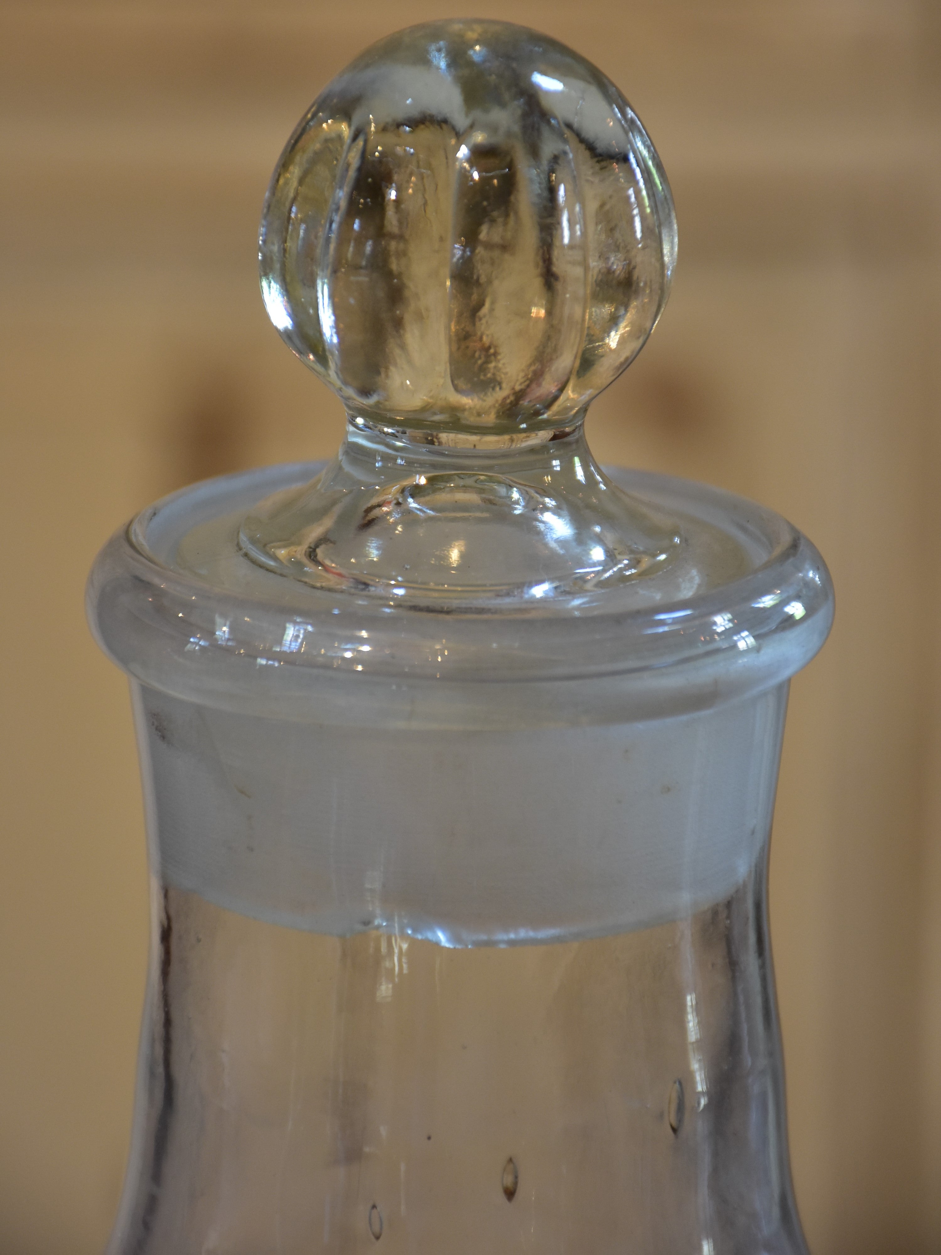 Collection of six antique French bottles with lids