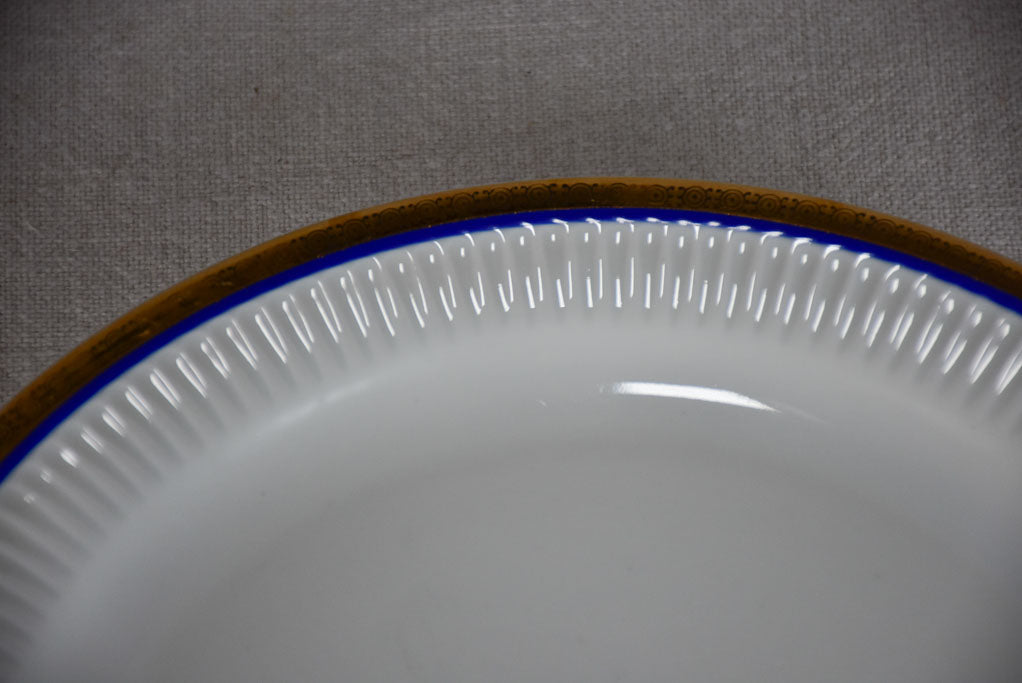 Vintage dinnerware with blue and gold trim