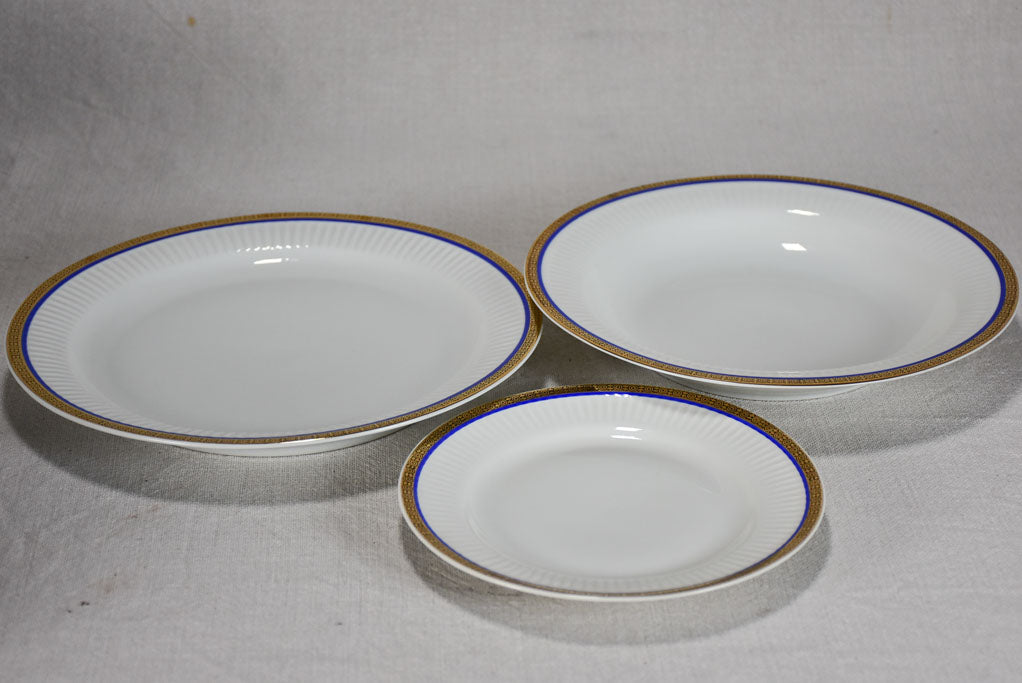 Vintage dinnerware with blue and gold trim