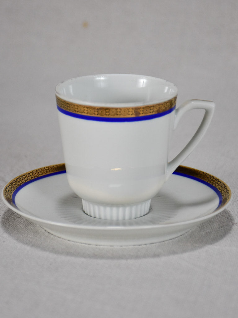 Vintage dinnerware with blue and gold trim