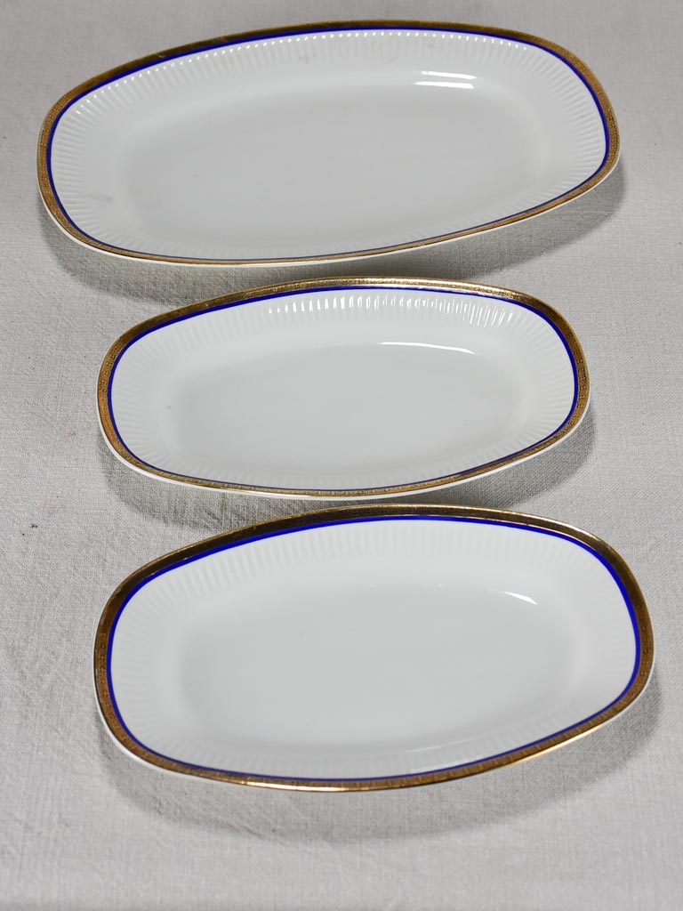 Vintage dinnerware with blue and gold trim