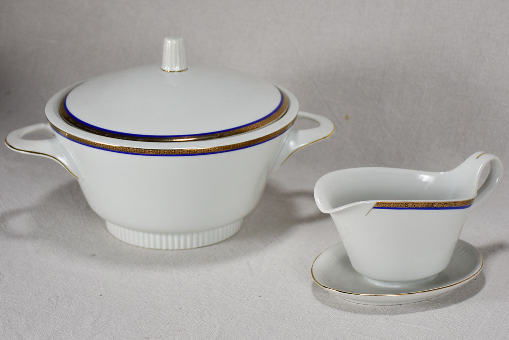 Vintage dinnerware with blue and gold trim