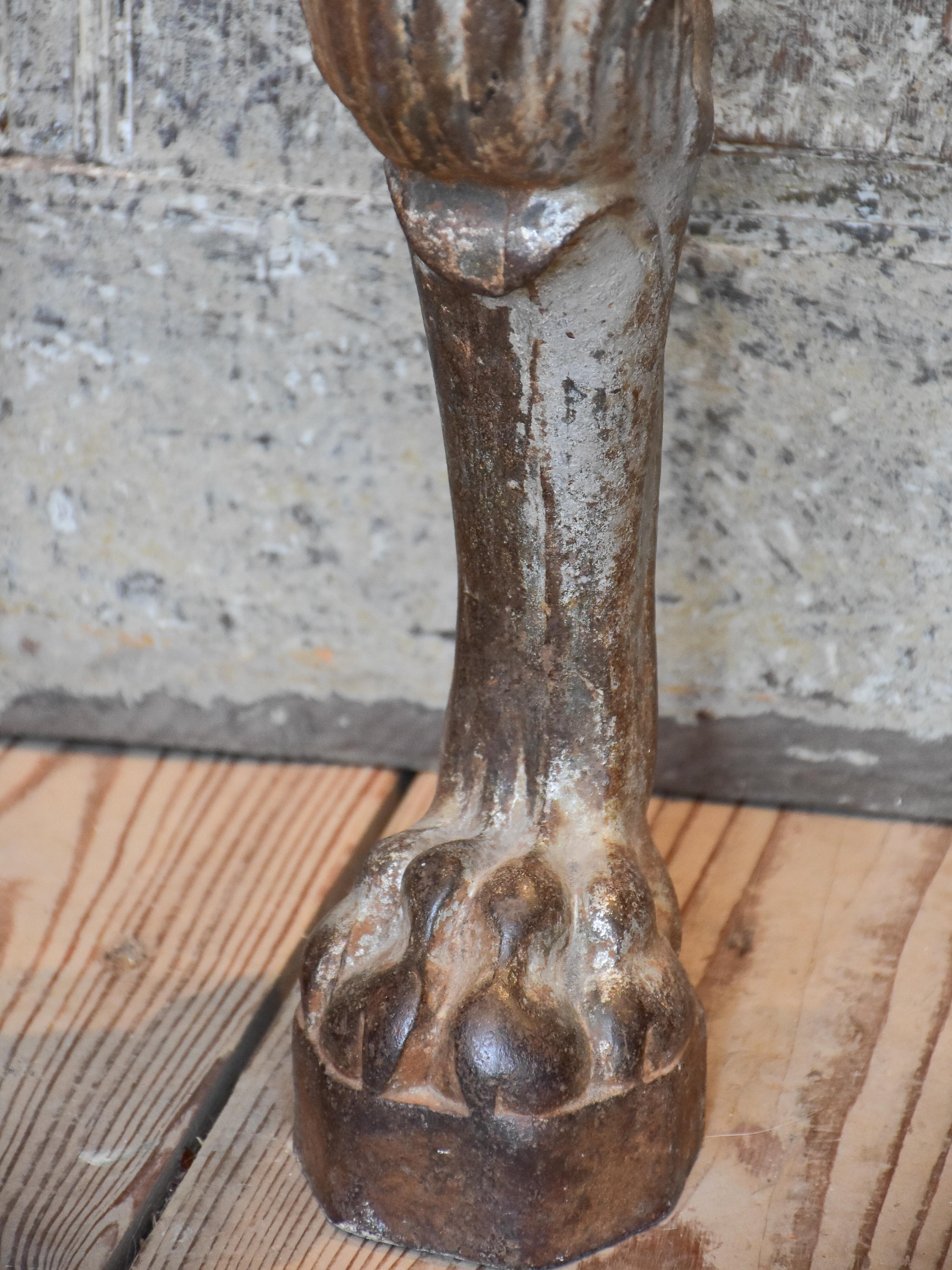 Two console table legs with lion heads and claw feet