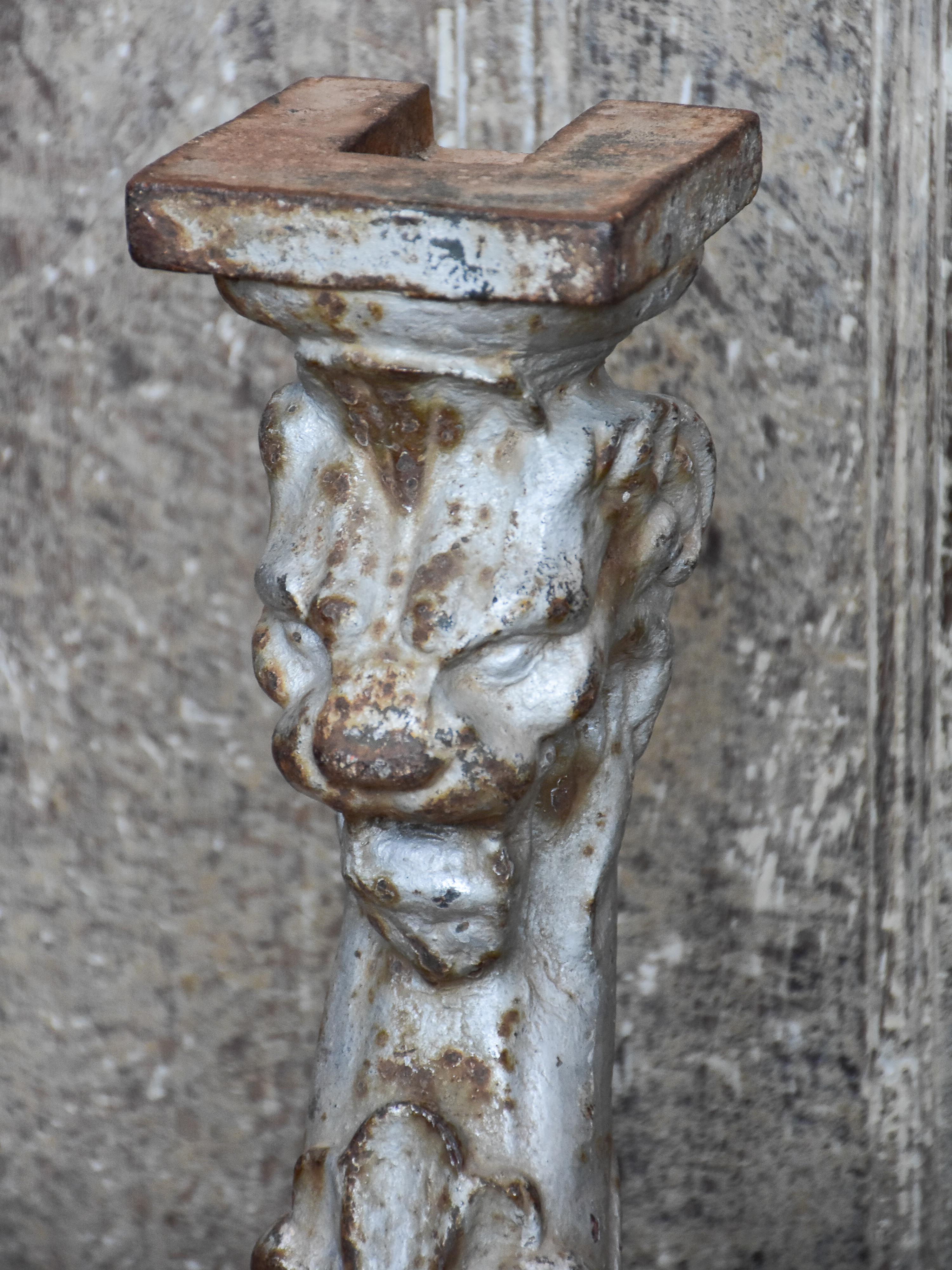 Two console table legs with lion heads and claw feet