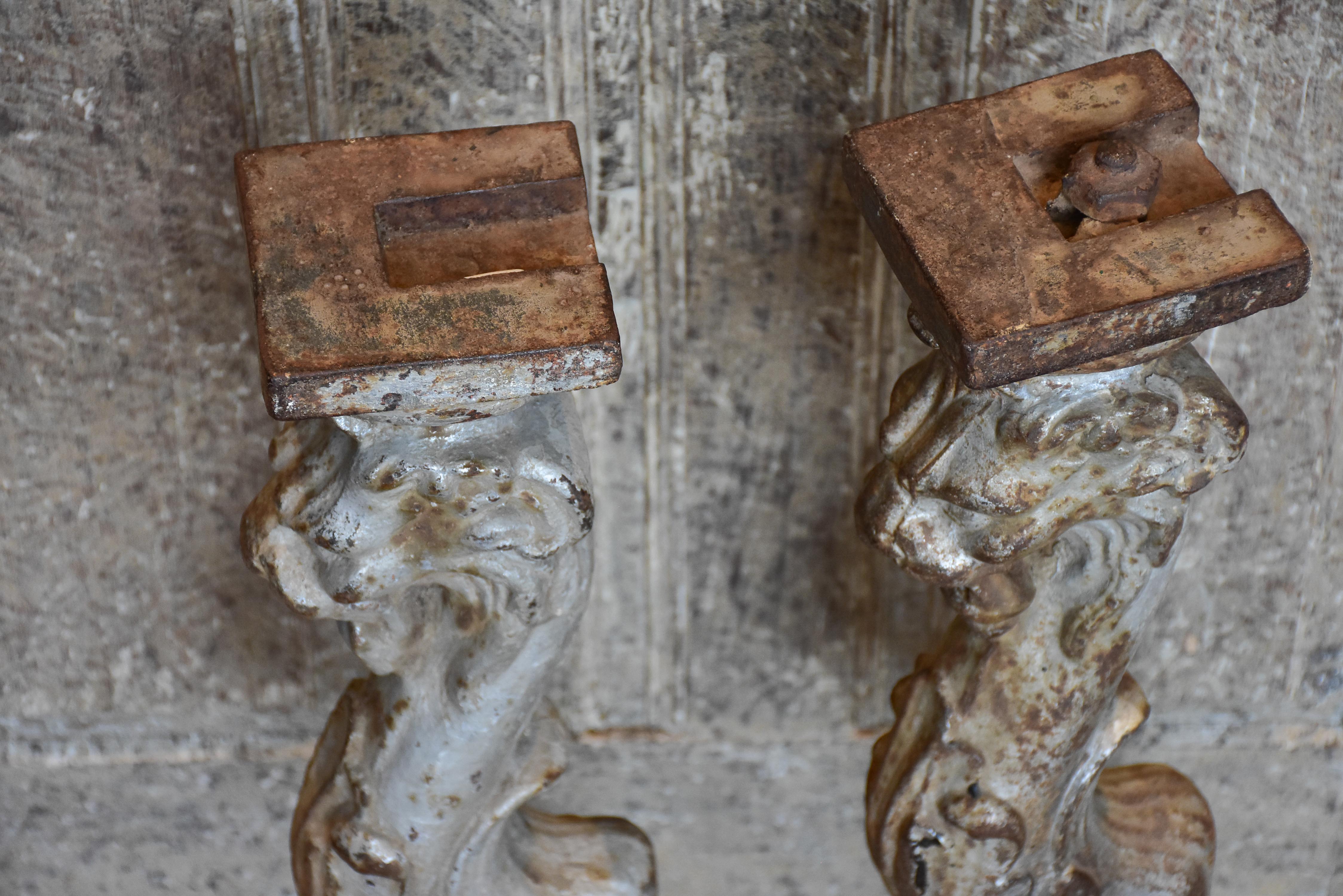 Two console table legs with lion heads and claw feet