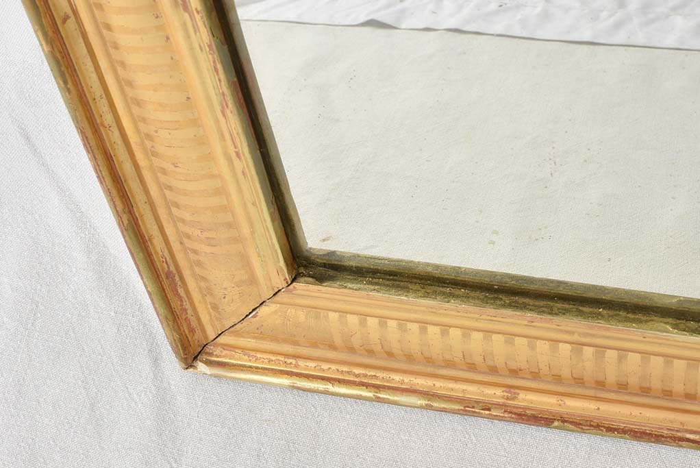 Gold Louis Philippe mirror with striped frame 34¾" x 27¼"