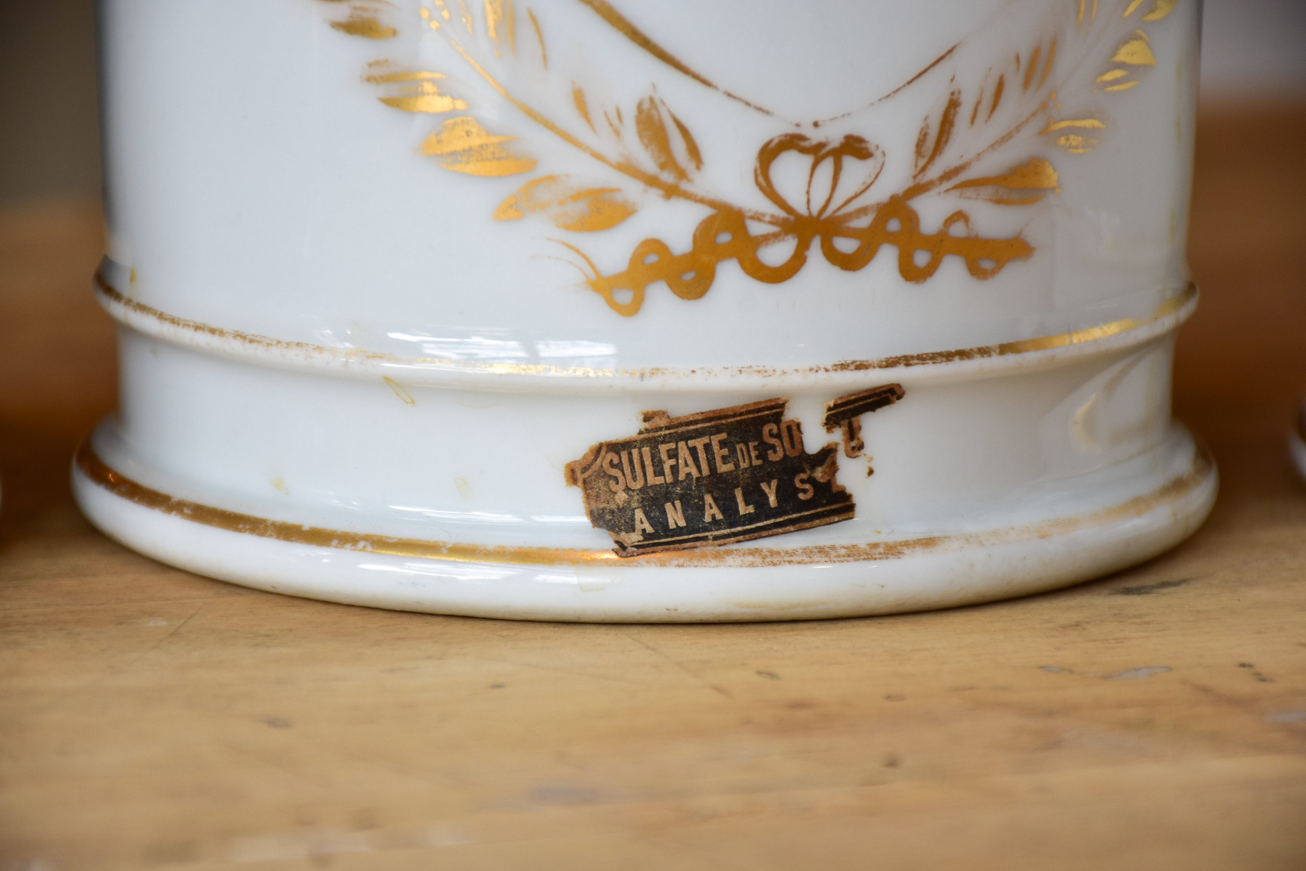 Set of seven French porcelain apothecary jars