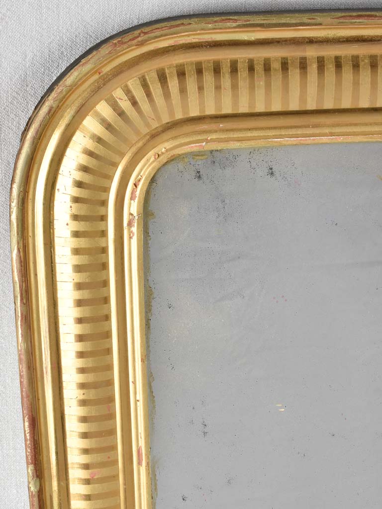 Gold Louis Philippe mirror with striped frame 34¾" x 27¼"